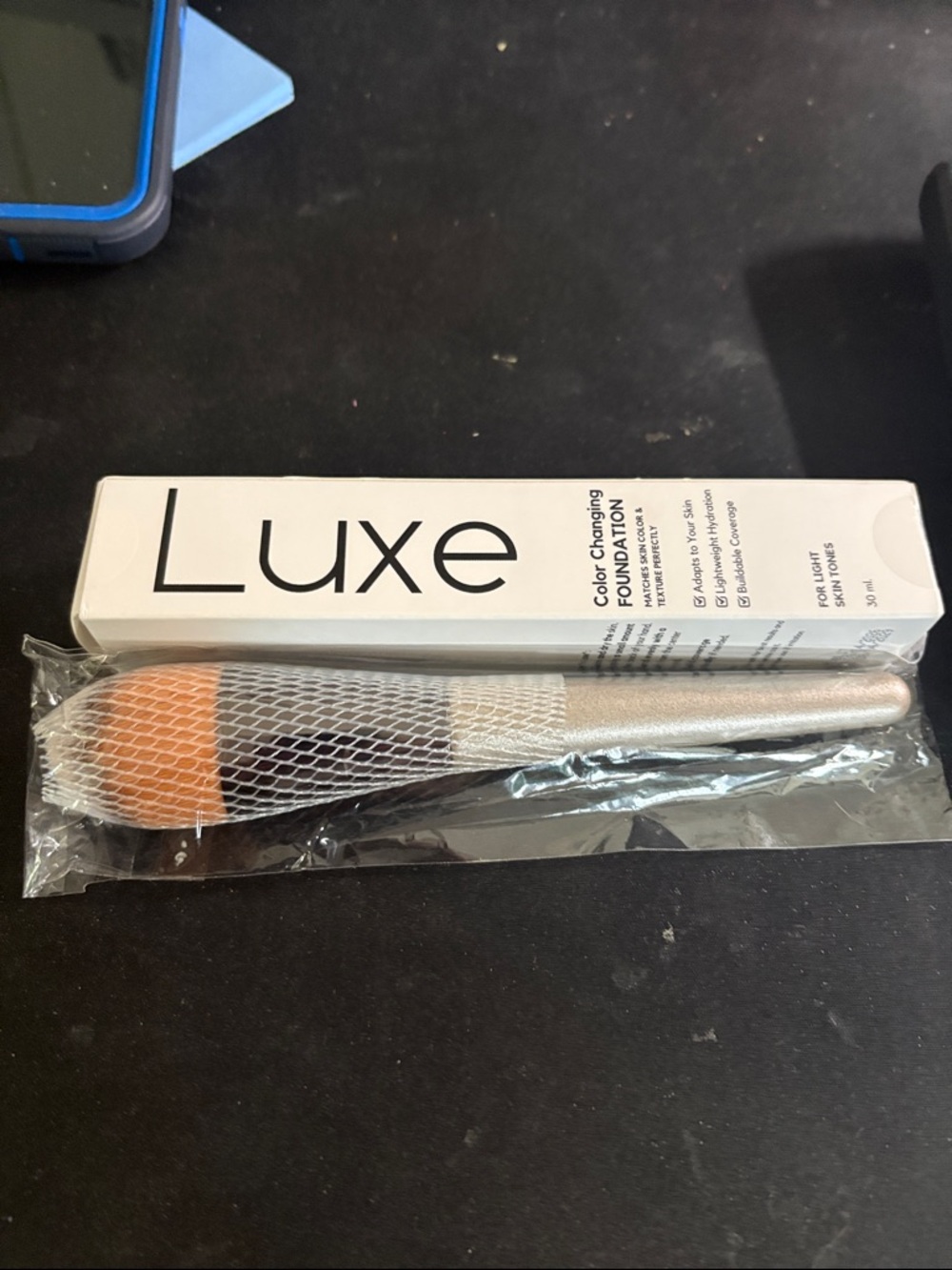 Luxe color changing Foundation and Brush with Silver Handle and Orange Bristles!